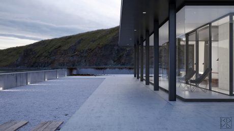 A modern architectural structure with a sleek, minimalist design and large windows overlooking a snowy landscape.