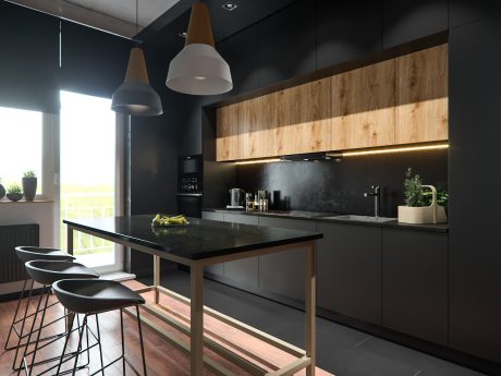 Modern kitchen with black cabinets, wooden accents, and pendant lighting creating a sleek, sophisticated look.