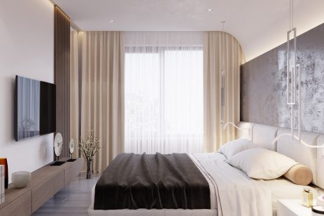 Luxurious bedroom with floor-to-ceiling curtains, minimalist decor, and a large window.