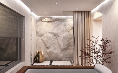 Modern living room with textured stone wall, minimalist decor, and natural wood accents.