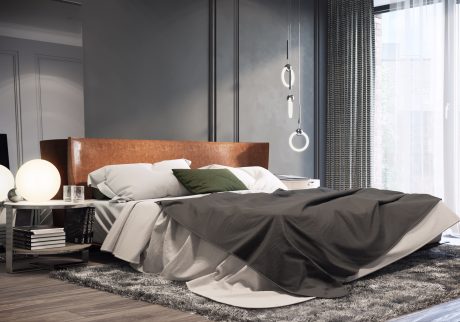 Sleek, modern bedroom design featuring a leather headboard, floor-to-ceiling curtains, and minimalist lighting fixtures.