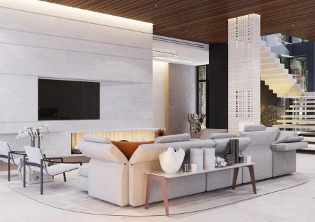 Contemporary living area with sleek wood paneling, marble walls, and modern furniture.