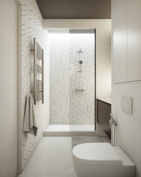 Sleek, modern bathroom with geometric tiled wall, minimalist fixtures, and neutral color palette.