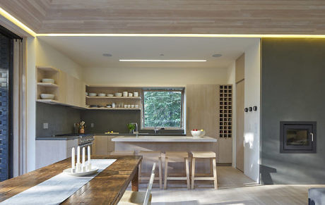 Contemporary kitchen with wooden accents and sleek design.