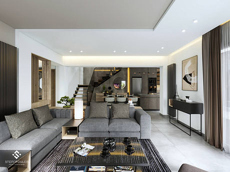 A modern, open-concept living space with sleek gray furniture, black accents, and a minimalist aesthetic.