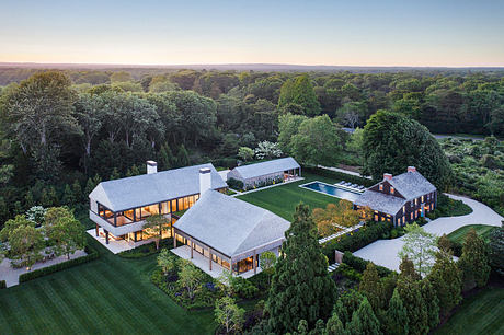 Sprawling luxury estate with a modern, multi-level design and a swimming pool.