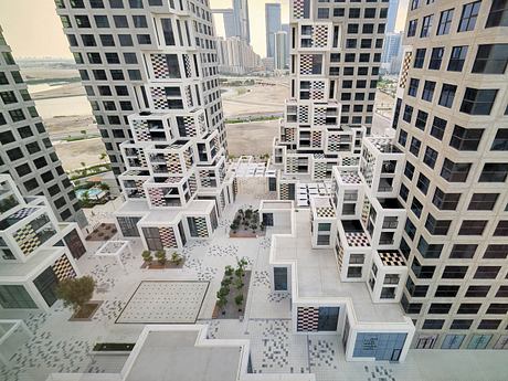 Striking modern architecture featuring intersecting geometric patterns and structures.