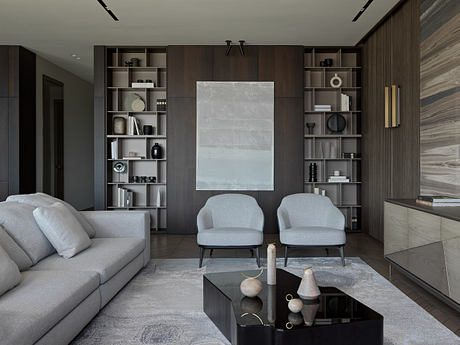 Sleek, modern living room with custom shelving, minimal decor, and focal artwork.