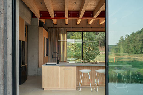 Country House Harmoniously Integrates with Serene Lakeside Setting in Poland - 4