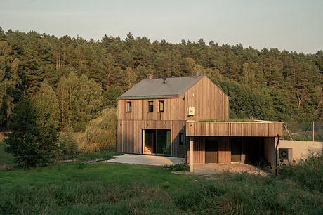 Country House Harmoniously Integrates with Serene Lakeside Setting in Poland - 8