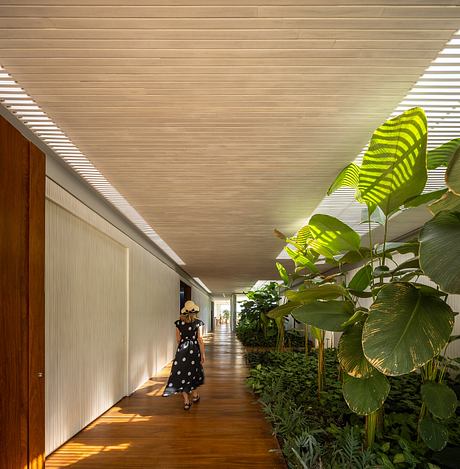 Casa Fluir is a L-Shaped House Designed Around a Shared Central Courtyard - 2