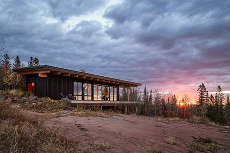 Burnt Rock: Olson Kundig Cabin Cantilevers Over Remote Minnesota Meadow - 6