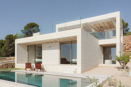 Stepped House Opens Up to Views Across Iberian Hills Around Swimming Pool - 1