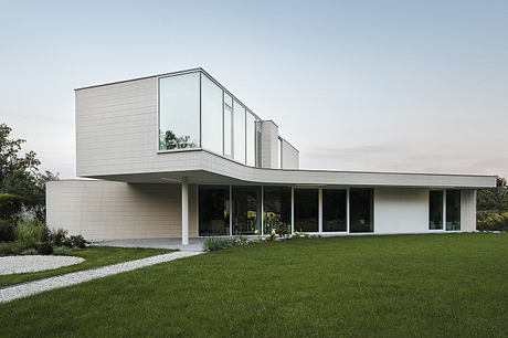 Swoosh House by Pawel Lis Architekci - 1