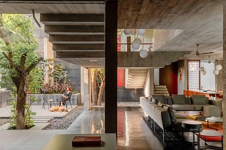 Trees Sliced Through Recasts Family Living Around Open Courtyards - 4