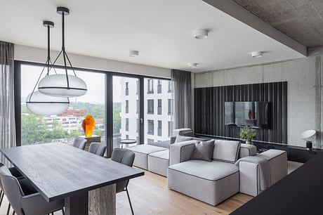 Marina Nova Refines Industrial Calm in a Riverfront Prague Apartment - 1