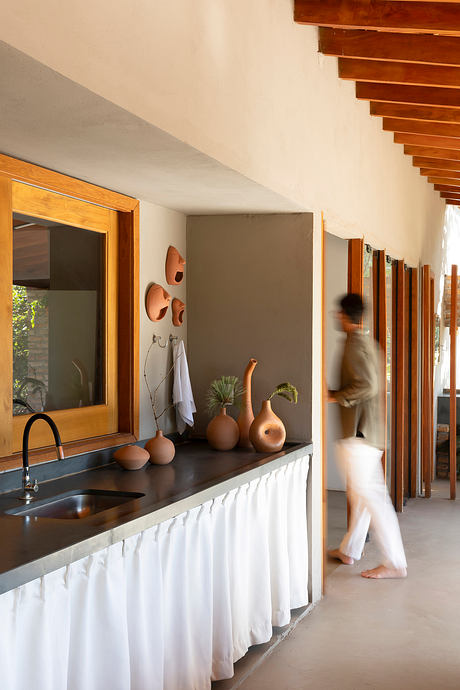 EL House Itajobi Finds Calm in Slate, Brick, and Sunlit Greens Beyond - 3
