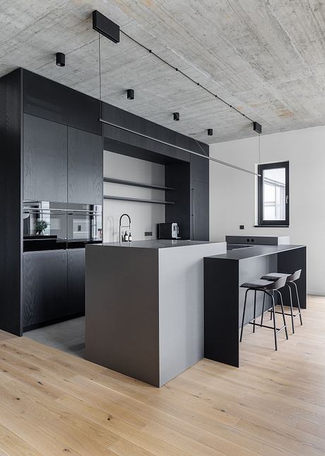 Marina Nova Refines Industrial Calm in a Riverfront Prague Apartment - 4