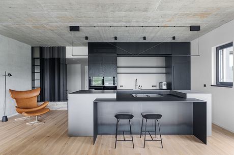 Marina Nova Refines Industrial Calm in a Riverfront Prague Apartment - 5