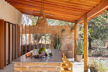 EL House Itajobi Finds Calm in Slate, Brick, and Sunlit Greens Beyond - 6