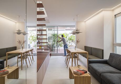 Casa Binôme: Reimagining a Madrid Duplex Around a Living Stair Core - 3