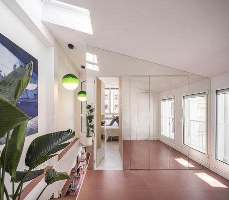 Casa Binôme: Reimagining a Madrid Duplex Around a Living Stair Core - 7