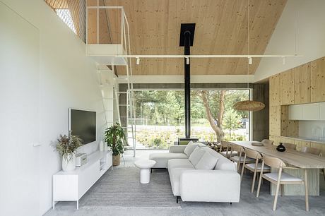 Kownatki Lake House Calm Geometry: Metal-Clad Refuge in the Pines - 2