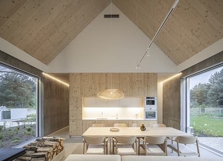 Kownatki Lake House Calm Geometry: Metal-Clad Refuge in the Pines - 5