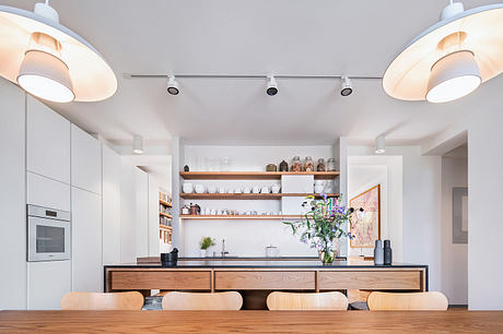 Home Again Reframes a 1950s House into a Warm Social Haven in Prague - 4