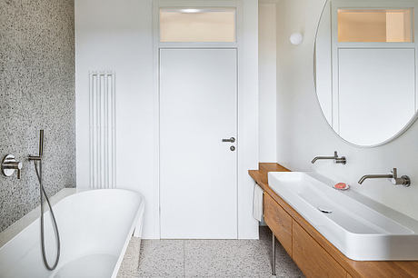 Home Again Reframes a 1950s House into a Warm Social Haven in Prague - 8