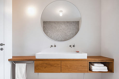 Home Again Reframes a 1950s House into a Warm Social Haven in Prague - 9