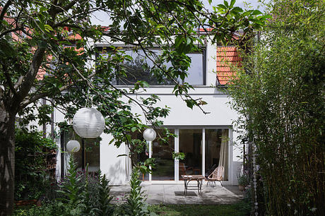Home Again Reframes a 1950s House into a Warm Social Haven in Prague - 10