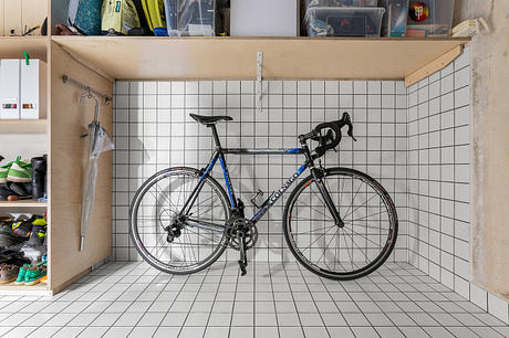 Painters’ Apartment Reworks a Panel Flat with Art and Plywood Details - 8