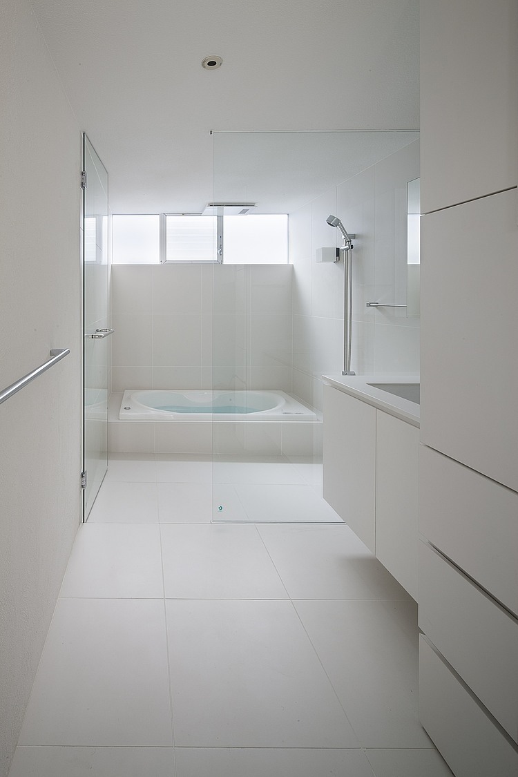 Frame House by Uid Architects & Associates