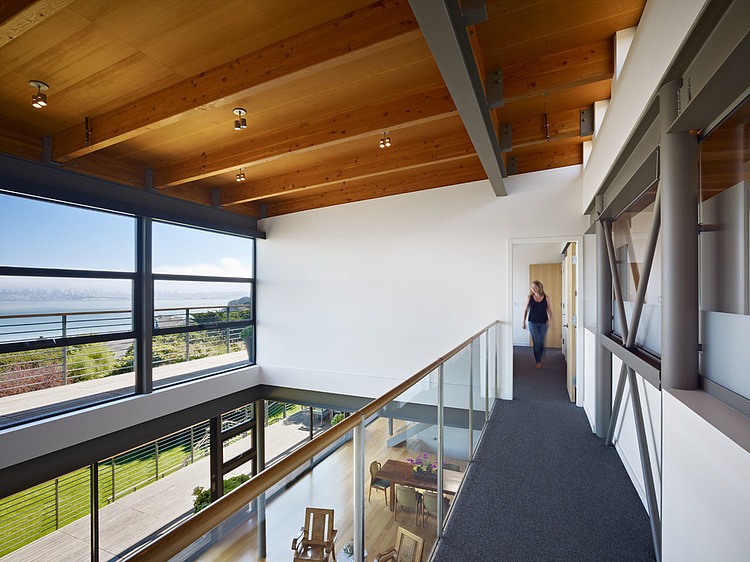 Coastal Hillside Home by Pfau Long Architecture