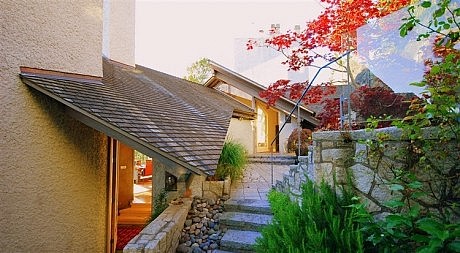 House on a Seaside Bluff by Paul Merrick - 1