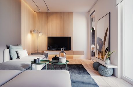 A modern, minimalist living room with wood-paneled walls, built-in TV unit, and glass coffee tables.