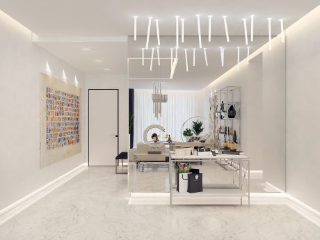 An expansive, modern living space with intricate lighting, marble flooring, and curated decor.