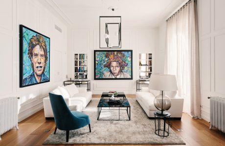 Stylish living room with modern furniture, vibrant artwork, and sleek design elements.