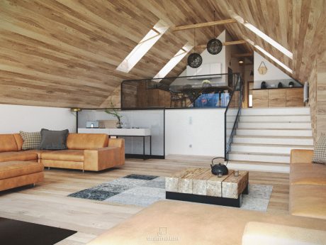 A cozy loft with a vaulted wooden ceiling, stairs, and a comfortable living area.