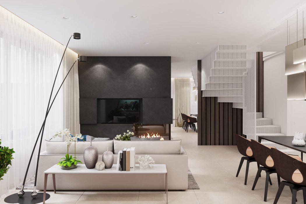 Spacious modern living room with minimalist furniture, lighting, and ornamental elements.