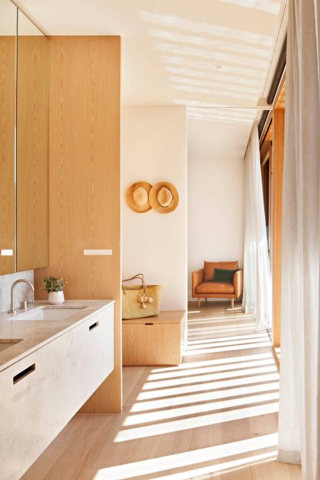 A cozy, modern interior with clean lines, warm wood tones, and natural textures.