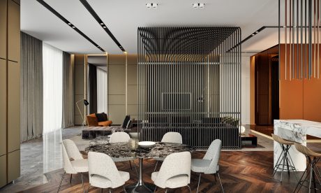 Sleek modern interior with bold black metal partition, marble dining table, and wood floor.