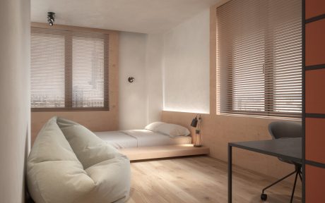 Minimalist bedroom with wooden flooring, beige walls, and horizontal blinds.