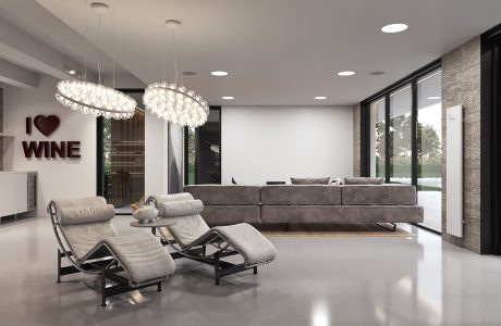 Elegant modern living room with plush seating, crystal chandeliers, and minimalist decor.