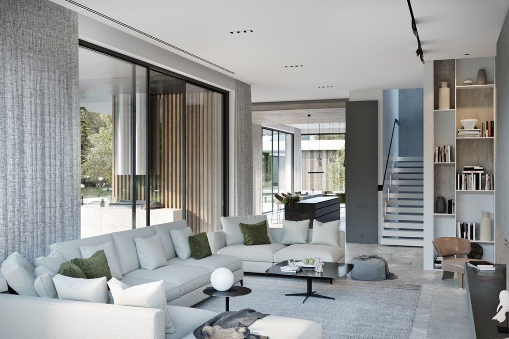 Spacious modern living room with floor-to-ceiling windows, neutral color palette, and minimalist furnishings.