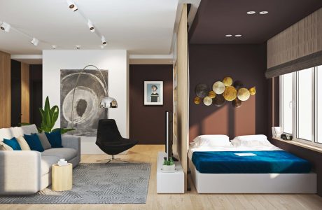 Luxurious modern bedroom with geometric art, plush bedding, and a stylish lighting setup.