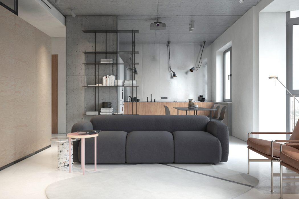Contemporary living room with concrete walls, wooden shelving, and comfortable gray sofa.