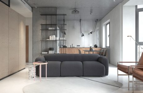 Contemporary living room with concrete walls, wooden shelving, and comfortable gray sofa.