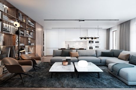 Spacious living room with a modular sofa, marble coffee table, wooden shelving, and track lighting.